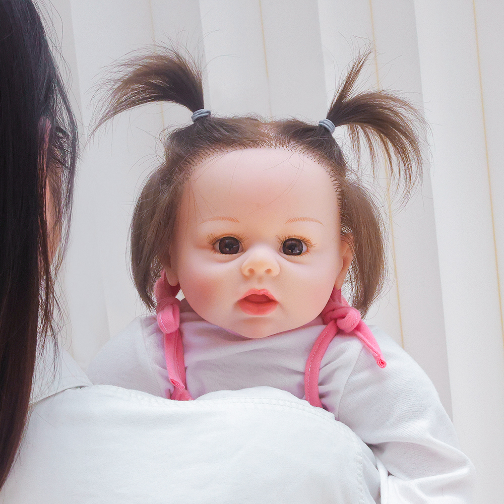 Silicone Doll with Pink Bib, 24-inch Realistic Handmade Detailed Face Realistic Feeling, Children's Toy