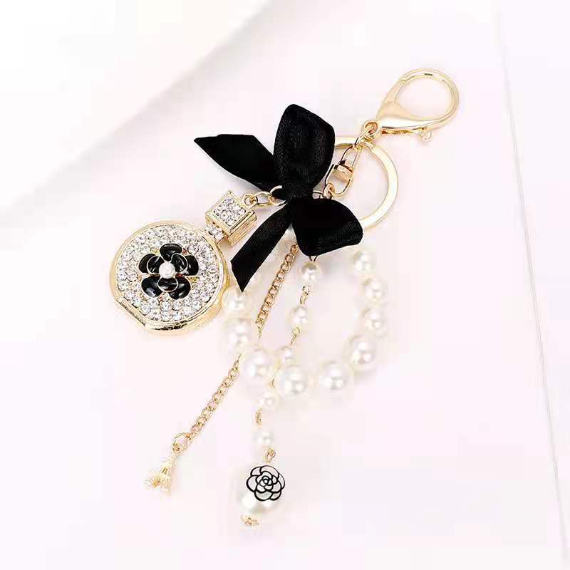 New Designer Perfume Bottle Bow Key Chain with Rhinestone Bling Beauty Inspired Keychain Accessory ﻿