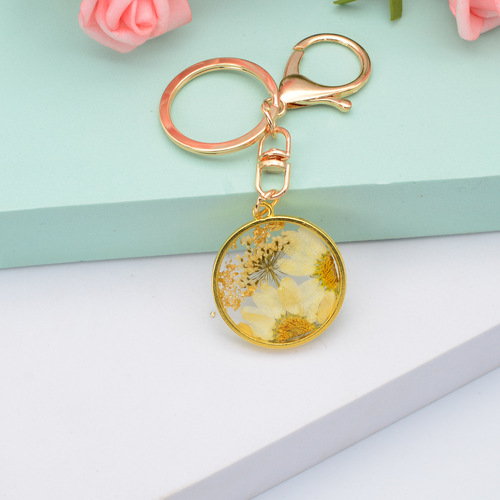 Daisy flower keychain Crystal drop glue round hanging fashion simple women's bag car small gift accessories