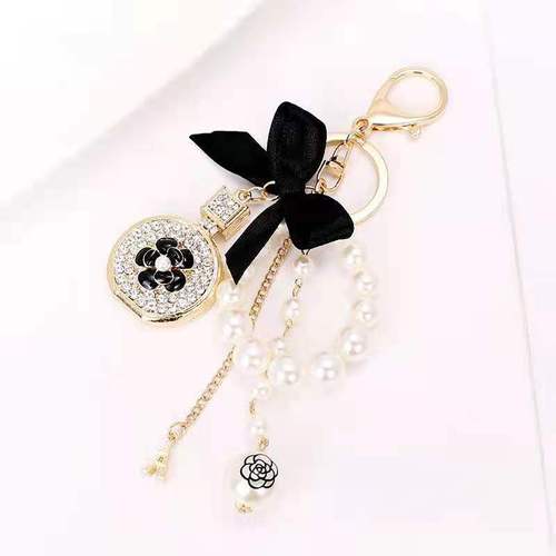 New Designer Perfume Bottle Bow Key Chain with Rhinestone Bling Beauty Inspired Keychain Accessory ﻿