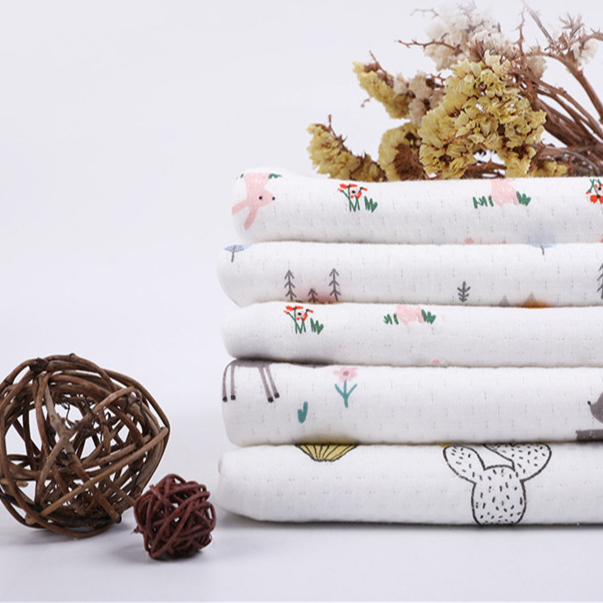 In stock bamboo fiber cartoon printing air layer knitted bamboo fiber fabric for baby quilt underwear