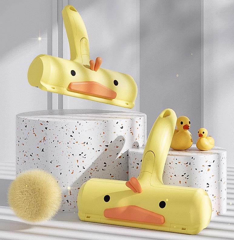 Yellow duck hair remover Rug Hair Cat dog hair Pet products Suction shaving brush Cat hair remover