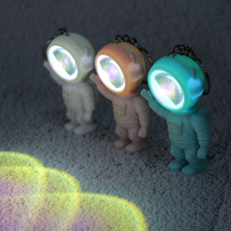 New Arrival Cartoon Sunset Light Space Astronaut Keychain Car Bag Fashion Creative Glowing Key Ring Small Gift Pendant O